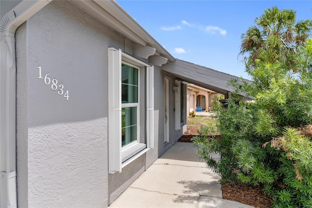 16834 Toledo Blade Blvd, Port Charlotte, FL 33954 - view of home's exterior with stucco siding