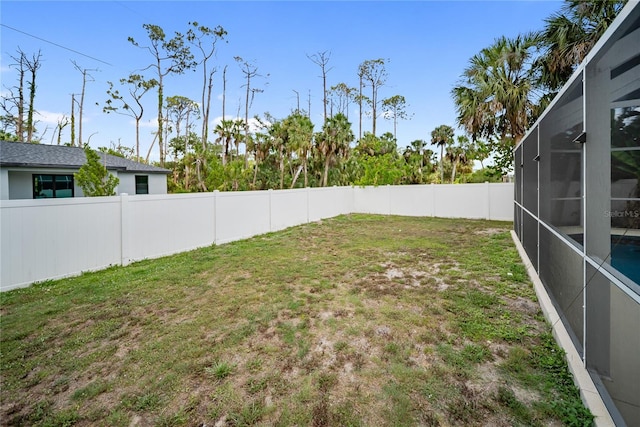 16834 Toledo Blade Blvd, Port Charlotte, FL 33954 - view of yard featuring a lanai