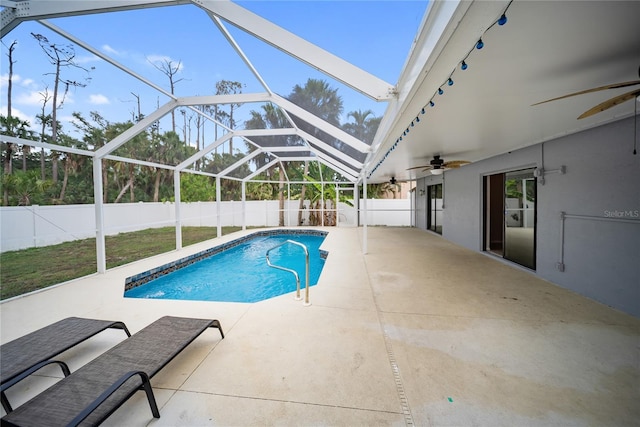 16834 Toledo Blade Blvd, Port Charlotte, FL 33954 - view of pool featuring a ceiling fan, a fenced backyard, a patio, and glass enclosure