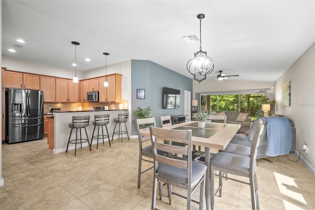 5866 Guarino Dr, Sarasota, FL 34238 - dining area with ceiling fan, baseboards, recessed lighting, and lofted ceiling
