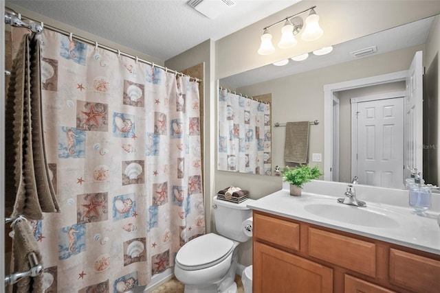 5866 Guarino Dr, Sarasota, FL 34238 - full bathroom featuring toilet, vanity, a textured ceiling, and a shower with curtain
