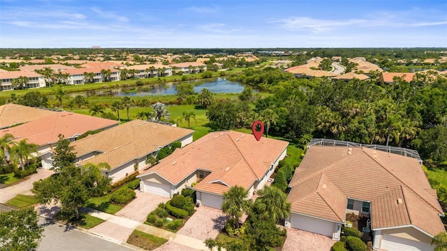 5866 Guarino Dr, Sarasota, FL 34238 - aerial perspective of suburban area featuring a nearby body of water