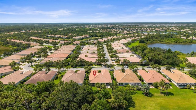 5866 Guarino Dr, Sarasota, FL 34238 - aerial perspective of suburban area featuring a nearby body of water