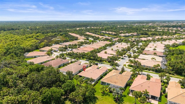5866 Guarino Dr, Sarasota, FL 34238 - aerial view of residential area featuring a heavily wooded area