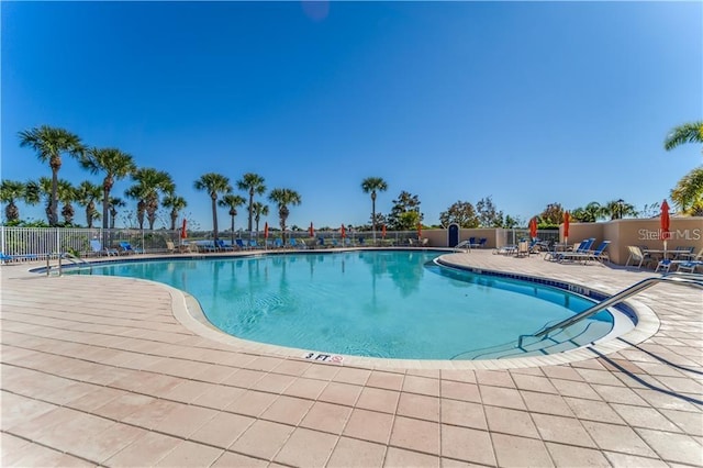 5866 Guarino Dr, Sarasota, FL 34238 - community pool featuring a patio
