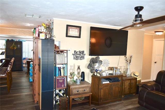 1099 6th Ave NE, Largo, FL 33770 - living room featuring wood finished floors, crown molding, and a ceiling fan
