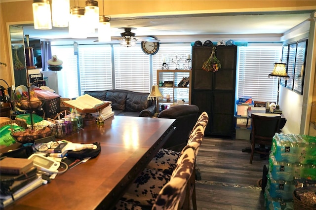 1099 6th Ave NE, Largo, FL 33770 - dining room featuring a ceiling fan and dark wood-style flooring