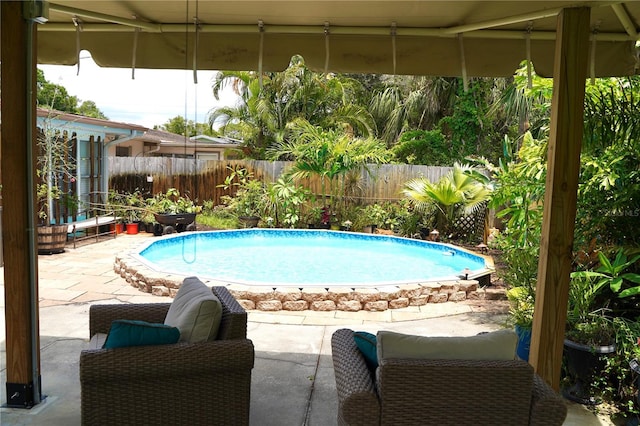 1099 6th Ave NE, Largo, FL 33770 - view of pool with a patio