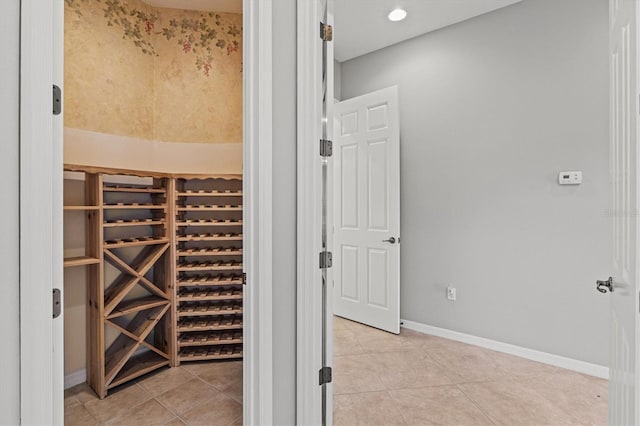 8930 Bloomfield Blvd, Sarasota, FL 34238 - wine room with light tile patterned floors