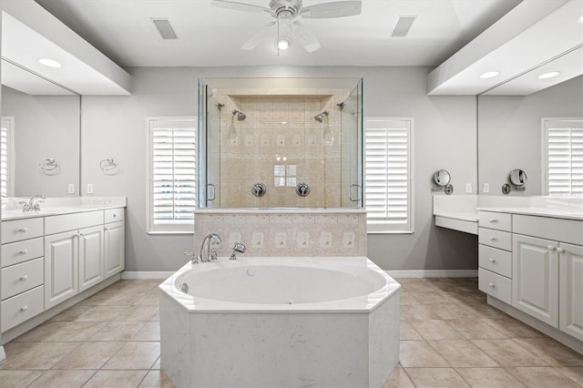 8930 Bloomfield Blvd, Sarasota, FL 34238 - bathroom featuring a bath, a stall shower, vanity, healthy amount of natural light, and recessed lighting