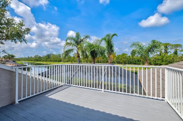 8930 Bloomfield Blvd, Sarasota, FL 34238 - wooden deck with a water view and view of scattered trees