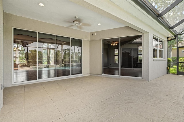 8930 Bloomfield Blvd, Sarasota, FL 34238 - view of patio / terrace featuring a ceiling fan and a lanai