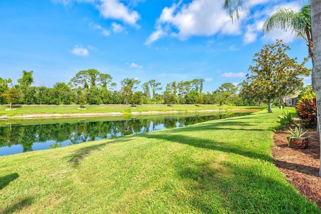 8930 Bloomfield Blvd, Sarasota, FL 34238 - view of green lawn featuring a water view