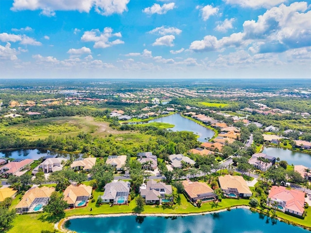 8930 Bloomfield Blvd, Sarasota, FL 34238 - aerial view of residential area with a large body of water