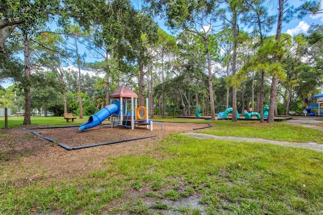 8930 Bloomfield Blvd, Sarasota, FL 34238 - community play area featuring a lawn
