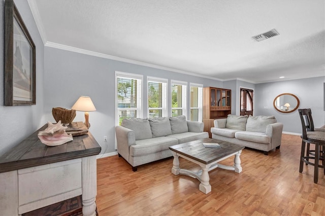 7913 19th Avenue Dr W, Bradenton, FL 34209 - living area featuring light wood-style flooring and crown molding