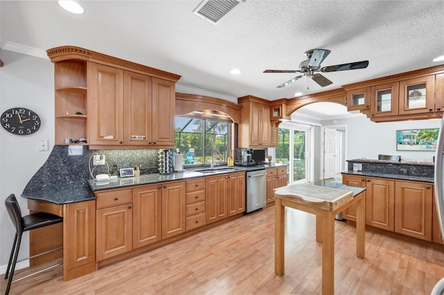 7913 19th Avenue Dr W, Bradenton, FL 34209 - kitchen featuring stainless steel dishwasher, light wood-style floors, decorative backsplash, a ceiling fan, and ornamental molding