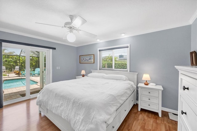 7913 19th Avenue Dr W, Bradenton, FL 34209 - bedroom featuring ornamental molding, access to exterior, wood finished floors, and a ceiling fan