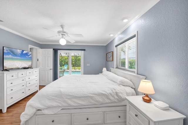7913 19th Avenue Dr W, Bradenton, FL 34209 - bedroom featuring access to exterior, wood finished floors, a textured wall, ornamental molding, and ceiling fan