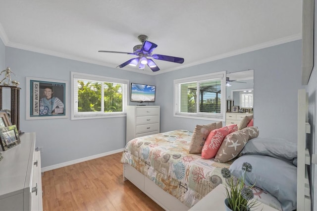 7913 19th Avenue Dr W, Bradenton, FL 34209 - bedroom featuring light wood finished floors, ornamental molding, and a ceiling fan
