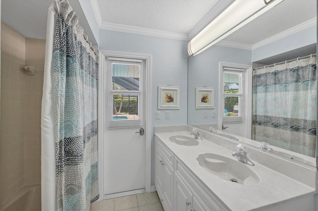 7913 19th Avenue Dr W, Bradenton, FL 34209 - bathroom featuring double vanity, plenty of natural light, tile patterned floors, and crown molding