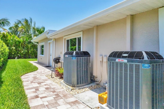 7913 19th Avenue Dr W, Bradenton, FL 34209 - exterior view of a central air condition unit and stucco siding
