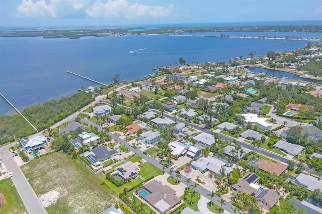 7913 19th Avenue Dr W, Bradenton, FL 34209 - aerial overview of property's location with a large body of water and nearby suburban area