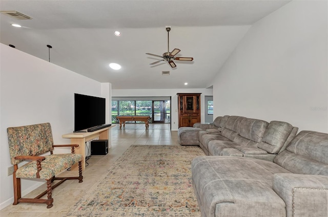 5651 Golf Pointe Dr Unit 5651, Sarasota, FL 34243 - living room featuring light tile patterned floors, recessed lighting, ceiling fan, lofted ceiling, and baseboards