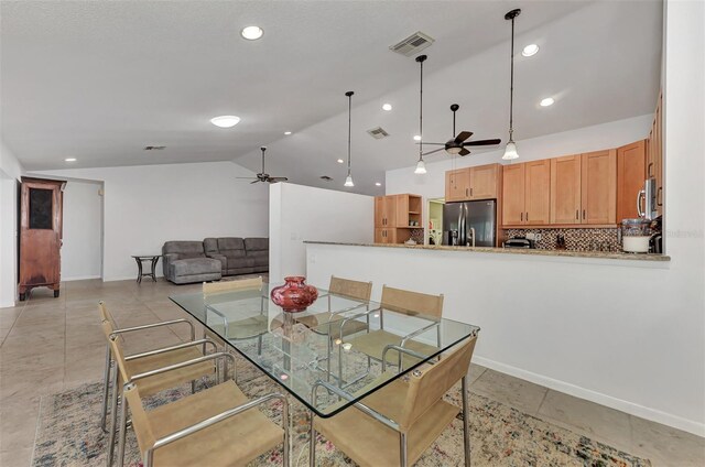 5651 Golf Pointe Dr Unit 5651, Sarasota, FL 34243 - dining room featuring ceiling fan, lofted ceiling, recessed lighting, baseboards, and light tile patterned flooring