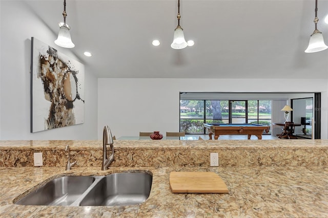 5651 Golf Pointe Dr Unit 5651, Sarasota, FL 34243 - kitchen featuring a sink, recessed lighting, light stone countertops, billiards, and decorative light fixtures