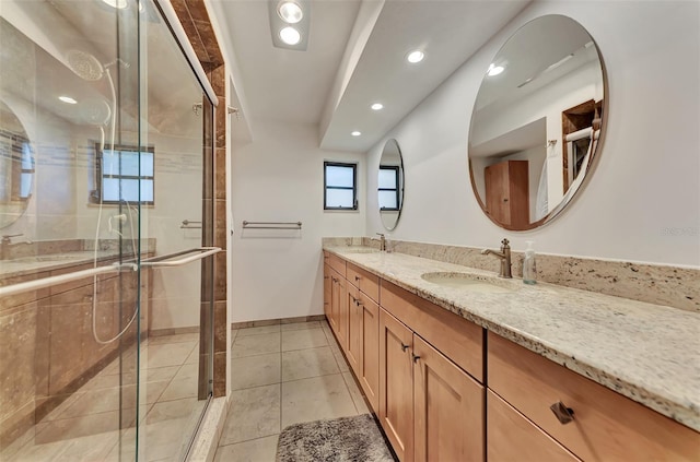5651 Golf Pointe Dr Unit 5651, Sarasota, FL 34243 - full bath with double vanity, baseboards, a stall shower, recessed lighting, and tile patterned floors