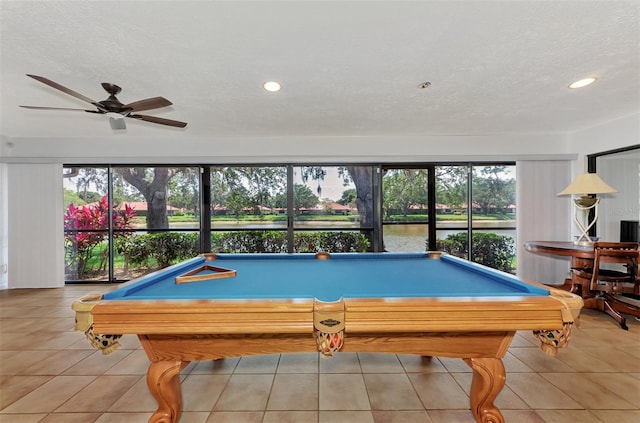 5651 Golf Pointe Dr Unit 5651, Sarasota, FL 34243 - recreation room with plenty of natural light, billiards table, tile patterned floors, recessed lighting, and a textured ceiling