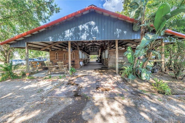 12714 Tyler Run Ave, Odessa, FL 33556 - view of parking featuring an exterior structure