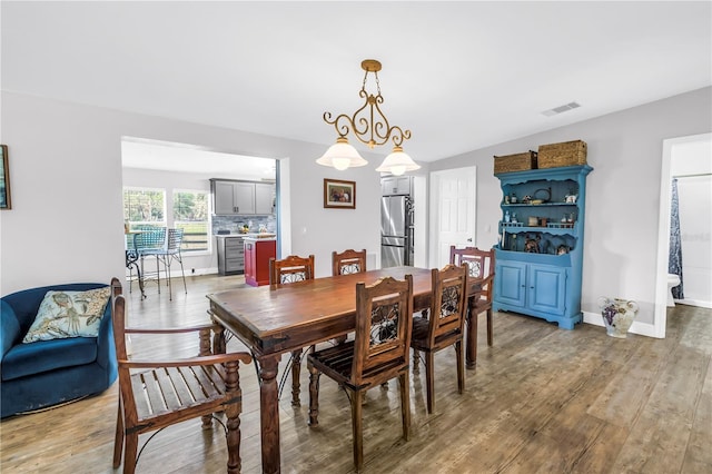 12714 Tyler Run Ave, Odessa, FL 33556 - dining space with light wood-type flooring and baseboards