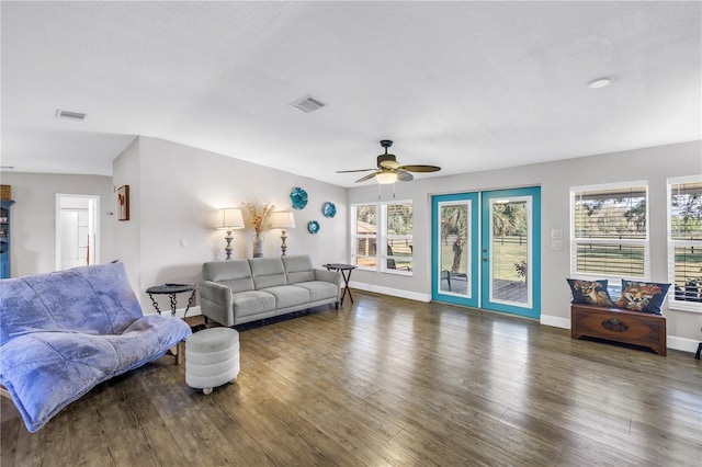 12714 Tyler Run Ave, Odessa, FL 33556 - living area featuring a ceiling fan, wood finished floors, and baseboards