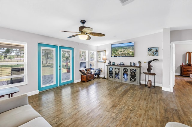 12714 Tyler Run Ave, Odessa, FL 33556 - living room with wood finished floors, ceiling fan, and baseboards
