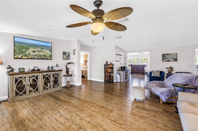 12714 Tyler Run Ave, Odessa, FL 33556 - living area with wood finished floors, a ceiling fan, and baseboards
