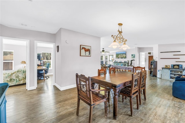 12714 Tyler Run Ave, Odessa, FL 33556 - dining area featuring wood finished floors and baseboards