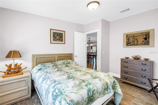 12714 Tyler Run Ave, Odessa, FL 33556 - bedroom featuring wood finished floors and baseboards