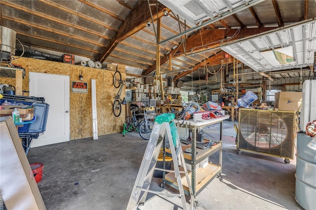 12714 Tyler Run Ave, Odessa, FL 33556 - garage with a workshop area