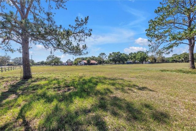 12714 Tyler Run Ave, Odessa, FL 33556 - view of green lawn featuring a rural view