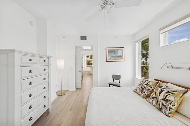 516 Tamiami Trl S Unit 306, Nokomis, FL 34275 - bedroom featuring light wood finished floors and a ceiling fan