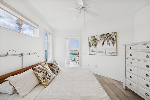 516 Tamiami Trl S Unit 306, Nokomis, FL 34275 - bedroom featuring light wood-type flooring and a ceiling fan