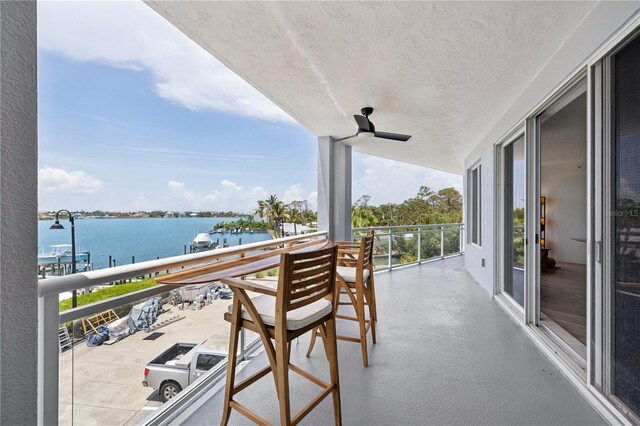 516 Tamiami Trl S Unit 306, Nokomis, FL 34275 - balcony with a water view and ceiling fan