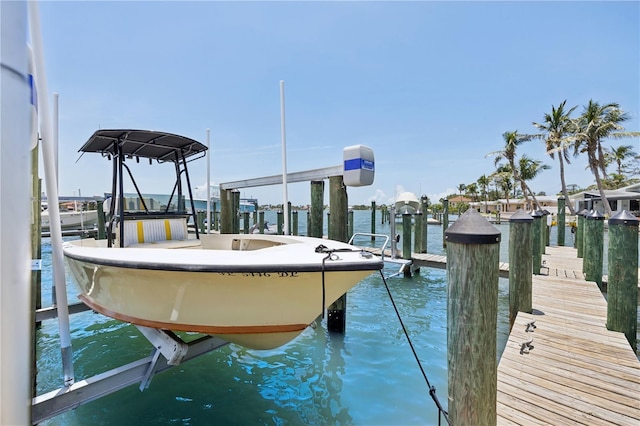 516 Tamiami Trl S Unit 306, Nokomis, FL 34275 - dock featuring boat lift and a water view