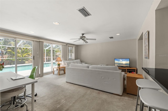 139 Adair Ave, Sarasota, FL 34243 - living area with ceiling fan, light colored carpet, and recessed lighting