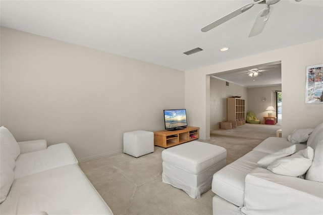 139 Adair Ave, Sarasota, FL 34243 - living room with light carpet, a ceiling fan, recessed lighting, and baseboards