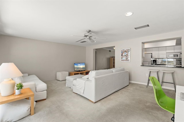 139 Adair Ave, Sarasota, FL 34243 - carpeted living area featuring ceiling fan, baseboards, and recessed lighting