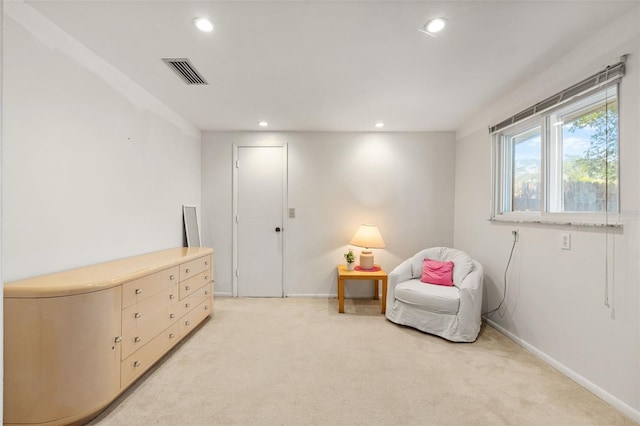 139 Adair Ave, Sarasota, FL 34243 - living area featuring light colored carpet, baseboards, and recessed lighting