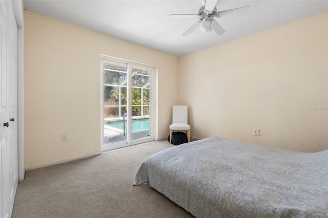 139 Adair Ave, Sarasota, FL 34243 - carpeted bedroom featuring access to exterior, baseboards, and ceiling fan
